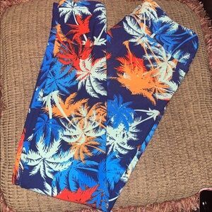 LulaRoe One Size leggings, NEW, Dark Blue background w/ 🌴 in red orange blue grn